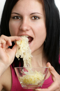 Woman Eating Cabbage